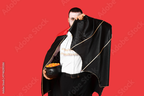 Young man dressed as vampir...