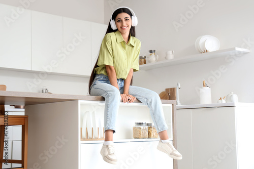 Smiling young woman wearing...
