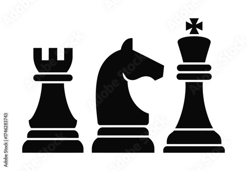 Black silhouette of chess pieces rook knight and king on white background