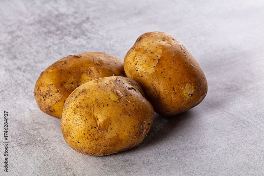 Fototapeta premium Raw potato heap for cooking