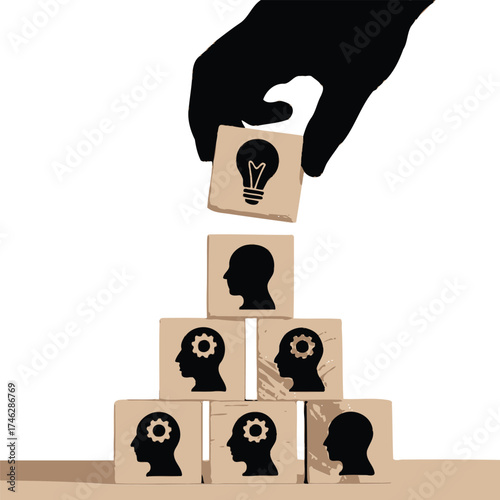 Hand places lightbulb idea block on pyramid of human head blocks