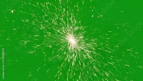A dynamic VFX particle explosion design, this sparkling burst effect is isolated on a green screen for creative video projects