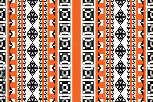 Tribal geometric fabric pattern in orange, black, and white tones. Featuring bold lines and symmetrical triangles, this modern ethnic design is perfect for clothing, home decor, wallpaper, fashion fab