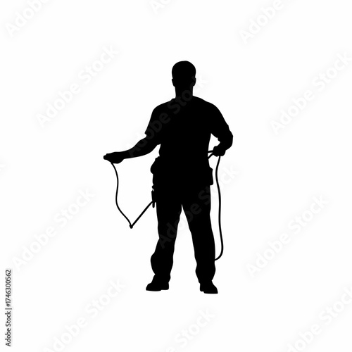 Silhouette of an electrician connecting power cables on site isolated on white background