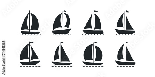 Collection of eight black sailing boat silhouettes on white