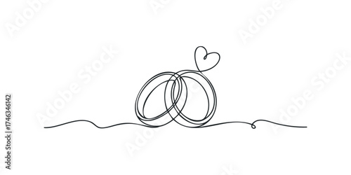Two intertwined wedding rings with a small heart symbol