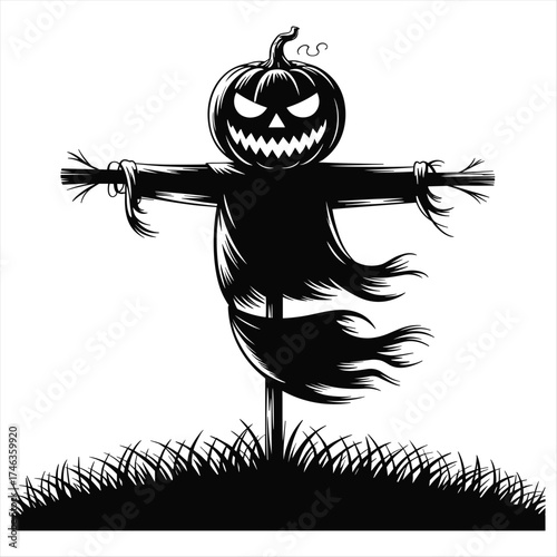 Scary jack o lantern scarecrow silhouette on a grassy hill