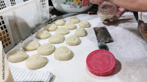The process of making fried bread buns, or known as Ham Chim Peng, a popular food in Indonesia, Malaysia and Singapore, especially among Chinese descendants.