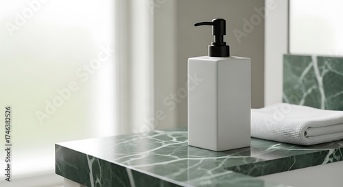 Modern bathroom design featuring green marble countertop and sleek accessories