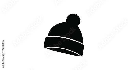 Cozy black beanie hat with pom-pom simple silhouette for cold weather apparel and winter fashion silhouette
