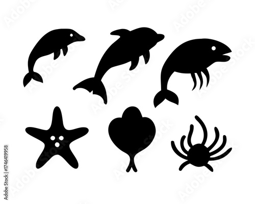 Marine animal silhouettes with dolphin, starfish and crab