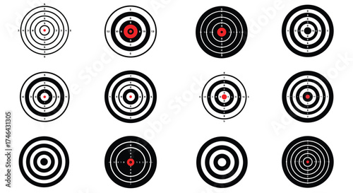 A collection of black and white target boards with red bullseyes