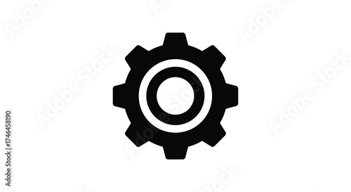 Classic cogwheel icon with inner rings representing mechanical precision and industrial settings silhouette