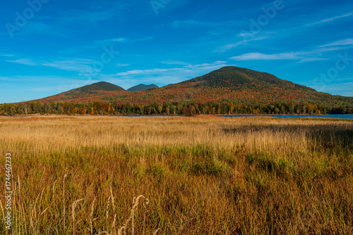Фотография Autumn colors at Flagstaff Lake with Sugarloaf Mountain in the distance, western