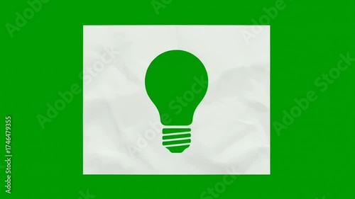 crumpled paper transforms into lightbulb idea on green screen