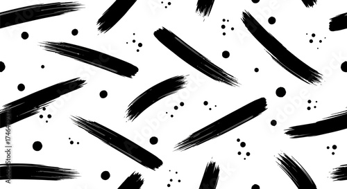 Abstract black brush strokes and dots on white background for modern art