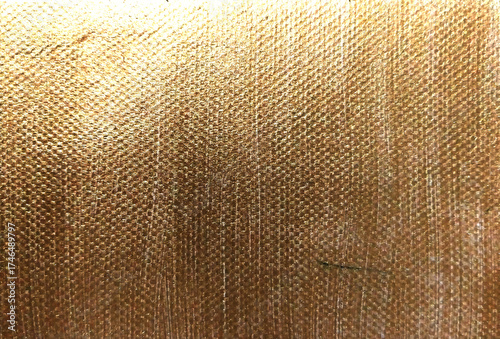 Obraz na płótnie golden texture on canvas fabric closeup for background