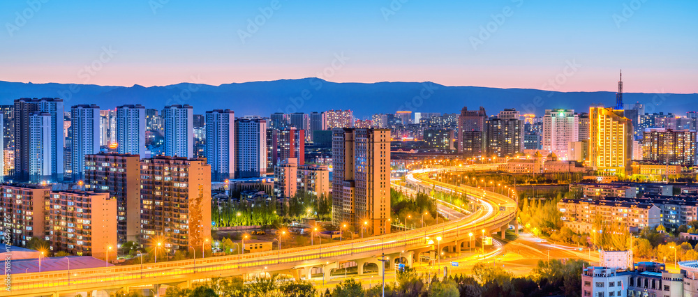 Fototapeta premium Night view of urban skyline in Jinqiao Development Zone, Hohhot, Inner Mongolia, China