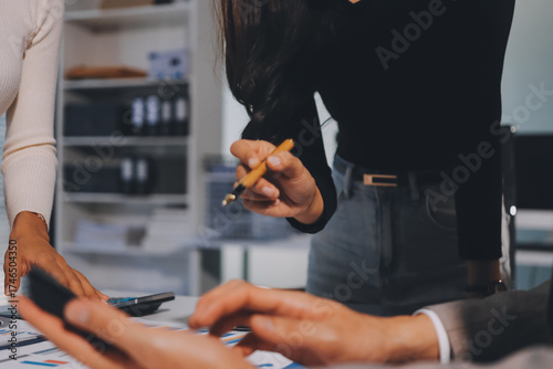 Accounting company provide finance and taxation planning for profitable cash flow, Auditor and accountant team working in office, analyze financial data and accounting record with calculator.Insight