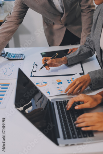 Accounting company provide finance and taxation planning for profitable cash flow, Auditor and accountant team working in office, analyze financial data and accounting record with calculator.Insight