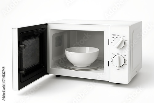 Open white microwave oven with ceramic bowl inside on white background