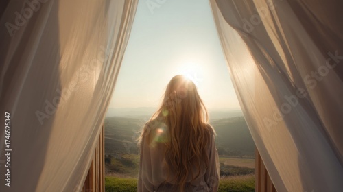 A person with long blonde hair stands before an open tent doorway, backlit by sunlight creating a radiant halo effect,