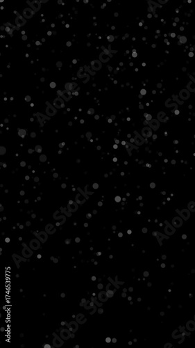 Vertical animation with falling shimmering bokeh particles. Seamless loop. Transparent background - alpha channel.
