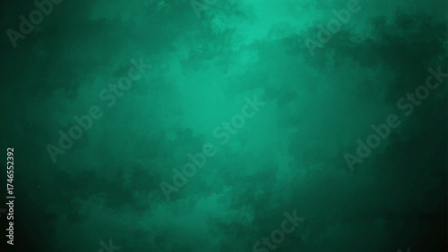 Abstract Dark teal grunge background with rough concrete texture, scratches, and faded paint. Softly lit center and dark edges with a moody, industrial, vintage, cinematic look in deep emerald tones