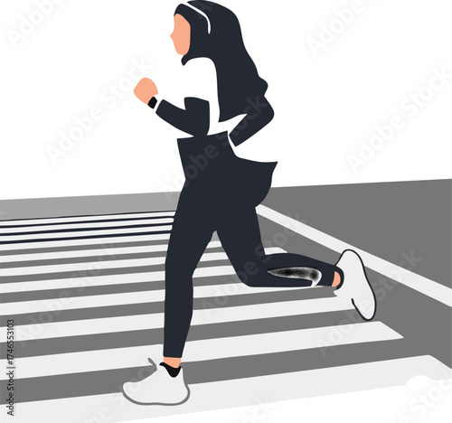 A woman wearing a hijab is jogging.