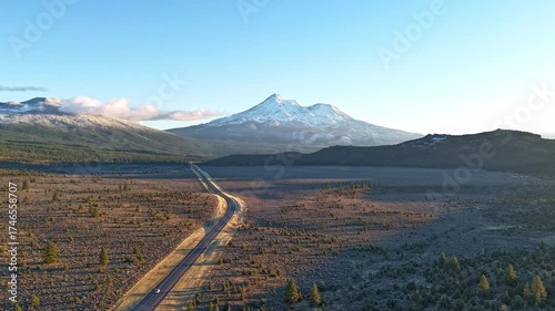 Mount Shasta in winter, time lapse of the Volcanic Legacy Scenic Byway leading towards the snow covered volcano, later afternoon, California, USA