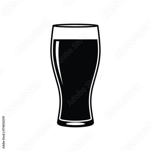 Dark liquid in a tall glass drink beverage