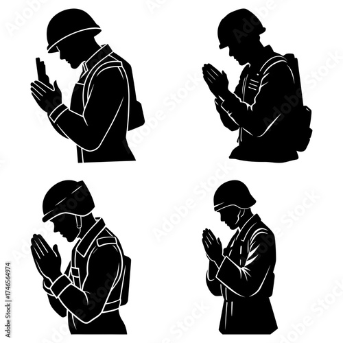 Four silhouettes of soldiers in uniform with helmets praying and paying respects in black and white