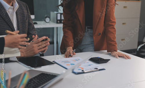 Accounting company provide finance and taxation planning for profitable cash flow, Auditor and accountant team working in office, analyze financial data and accounting record with calculator.Insight