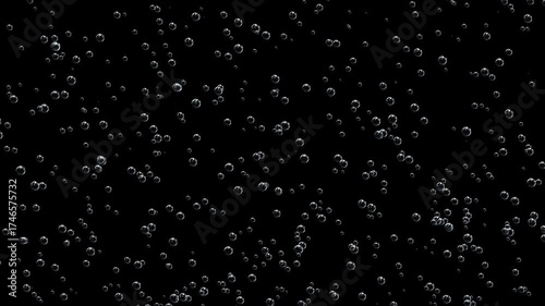 Realistic bubbles floating on a black background are perfect for advertising drinks or cleaning products.