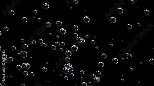 The effect of carbonated drink. Rising bubbles in a dark space. Sparkling water bubbles.