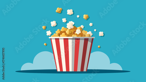 Classic red and white striped popcorn bucket overflowing with popcorn