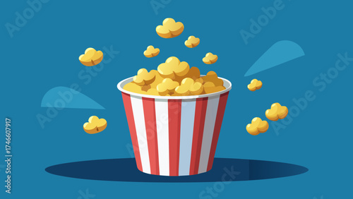 Classic red and white striped popcorn bucket overflowing with popcorn