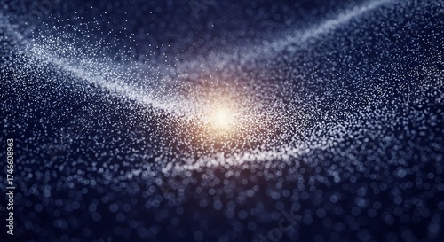 A captivating abstract digital artwork featuring a swirling wave of numerous glowing white and blue particles against a deep, dark blue background. A vibrant, warm light source at the core illuminates