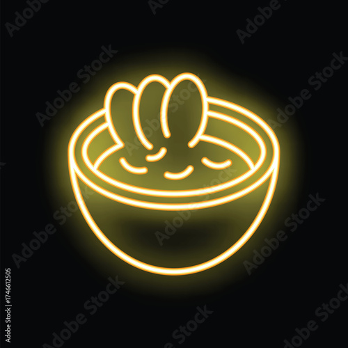 Neon sign is glowing yellow, showing a bowl with steam coming out of it