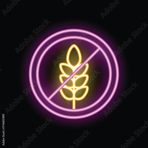 Neon gluten free sign is glowing on a black background representing a gluten intolerance dietary restriction