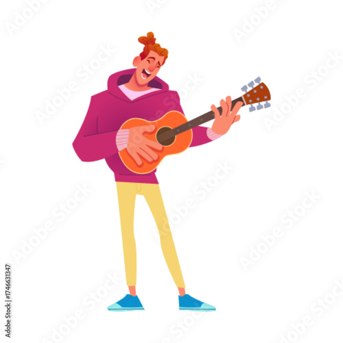 A Cheerful Musician Enthusiastically Playing His Guitar While Dressed in Casual Attire