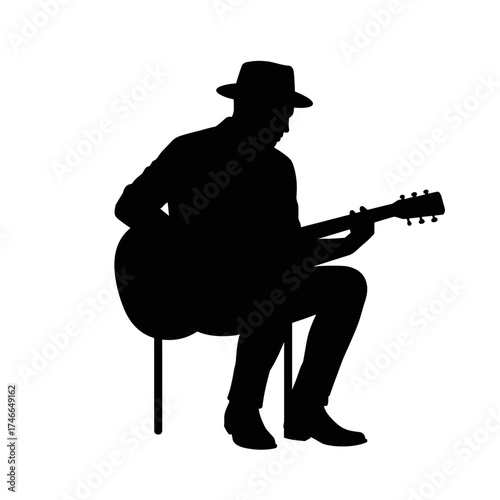 Man playing guitar while sitting on a chair, concept of International Men's Day  