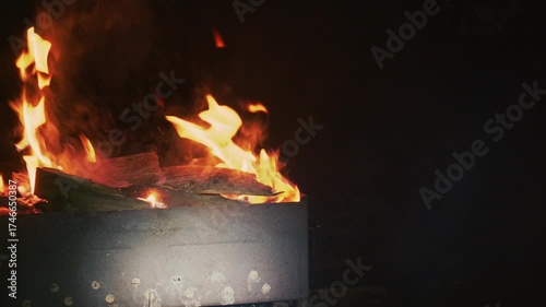 Grill Background, Hot Barbeque Empty Grill Iron Grate, Fired Barbecue Isolated On Black, Fire in slow motion Flaming BBQ Charcoal Grill,