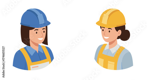 Smiling women construction workers in hard hats and overalls on white background