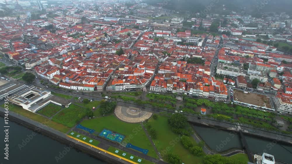 An aerial panoramic view of the old town in the City Viana do Castelo in Portugal on a cloudy day in summer. 