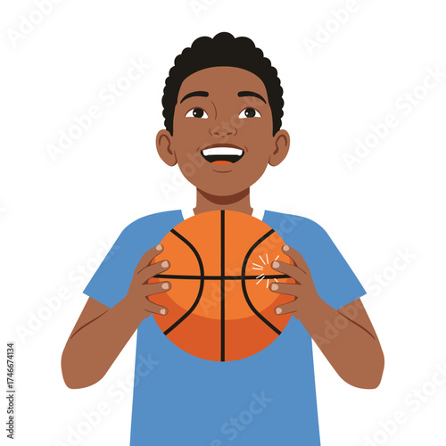 A cheerful young African American boy with a bright smile holds a basketball, ready for a game or practice session.