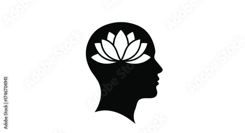 Silhouette of a human head with a blooming lotus flower representing inner peace and mindfulness