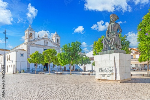 Statue of Infante Dom Henrique and church in Lagos Algarve Portugal