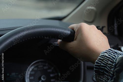 Man is driving safely on the road