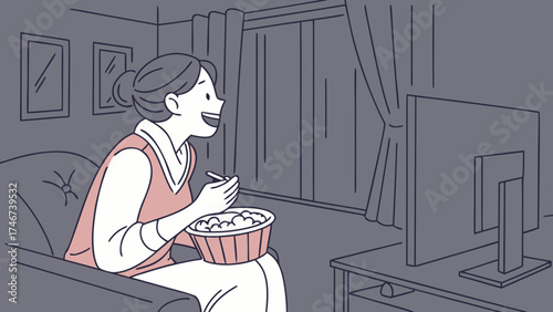 Woman watching tv with popcorn in a living room with curtains and framed pictures on the wall at night